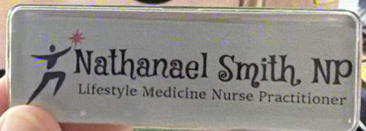 Name badge: Nathanael Smith, NP — Lifestyle Medicine Nurse Practitioner. Tap to open his profile.