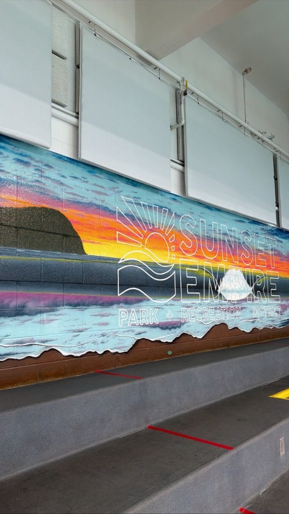 Sunset Empire Park and Recreation District mural depicting the Oregon coast.